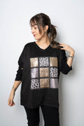 Polera Detalle animal print - Negro