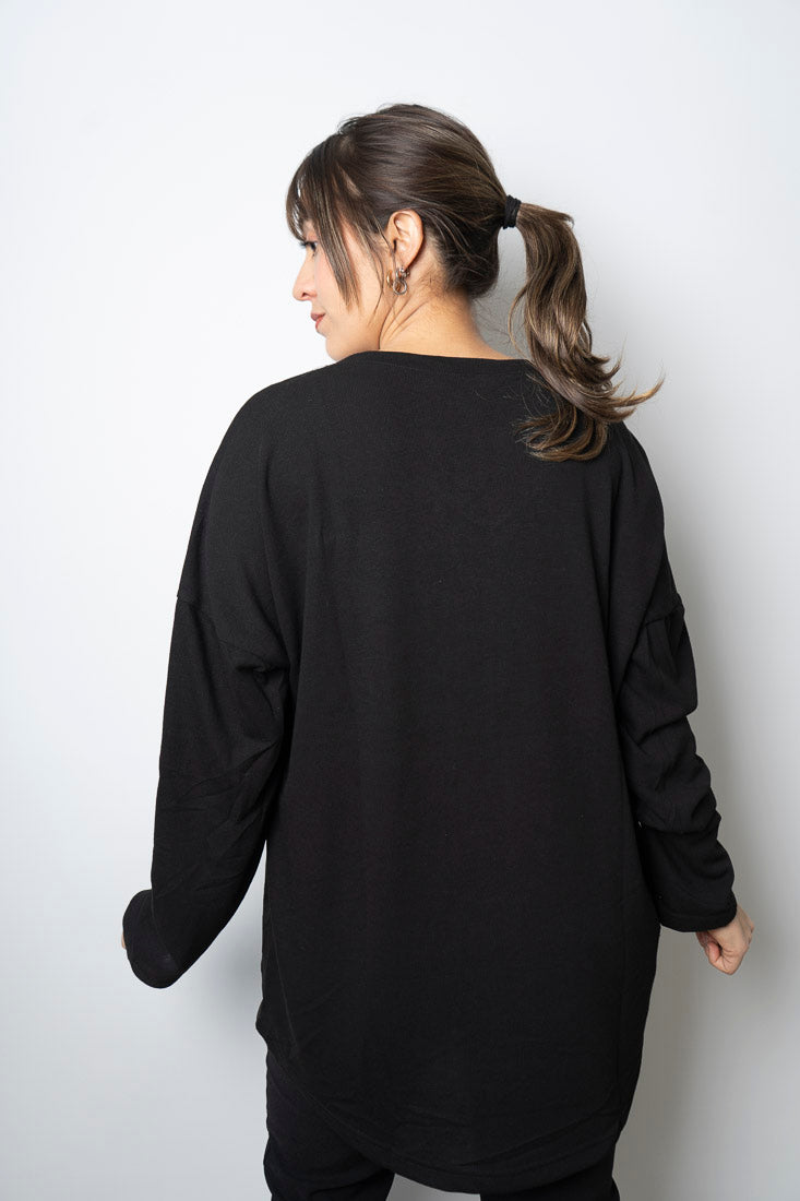 Polera Detalle animal print - Negro